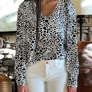 Loft! Sz Small. Animal print. White and Black blouse!